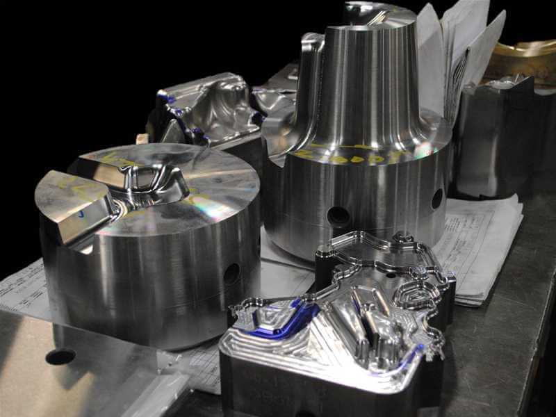 Screen shows several finished components ready for assembly into a high pressure die casting die